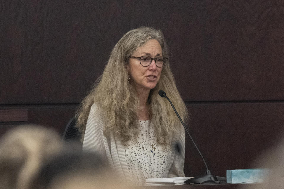 Karen Wilson, mother of Anna Moriah Wilson, speaks about her daughter to Kaitlin Armstrong after Armstrong was sentenced to 90 years in prison for Wilson's murder at the Blackwell-Thurman Criminal Justice Center on Friday, Nov. 17, 2023, in Austin, Texas. Armstrong was found guilty of killing Wilson in May 2022. (Mikala Compton/Austin American-Statesman via AP, Pool)