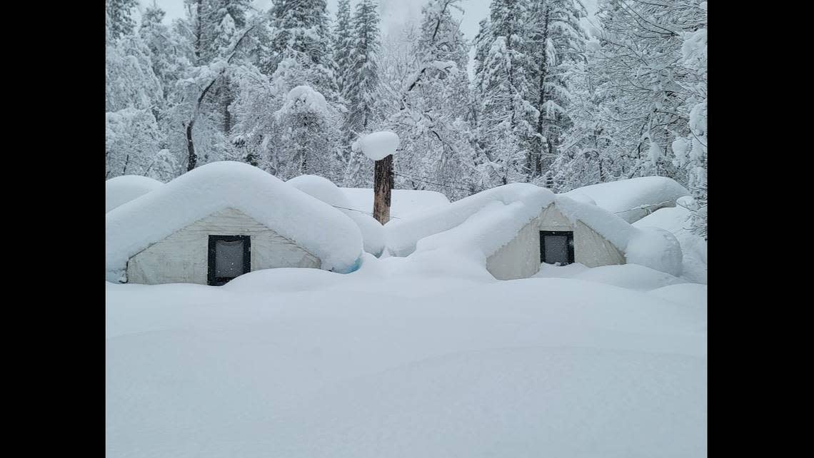 Tent cabins at Curry Village in Yosemite National Park are nearly covered in snow. Yosemite is closed to visitors after the park experienced significant snowfall with some areas recording up to 15 feet of snow, according to the National Park Service Facebook post on Tuesday, Feb. 28, 2023. Image courtesy of Yosemite National Park.