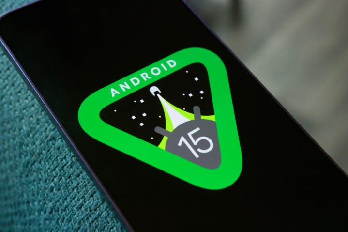 The Android 15 logo on a smartphone.