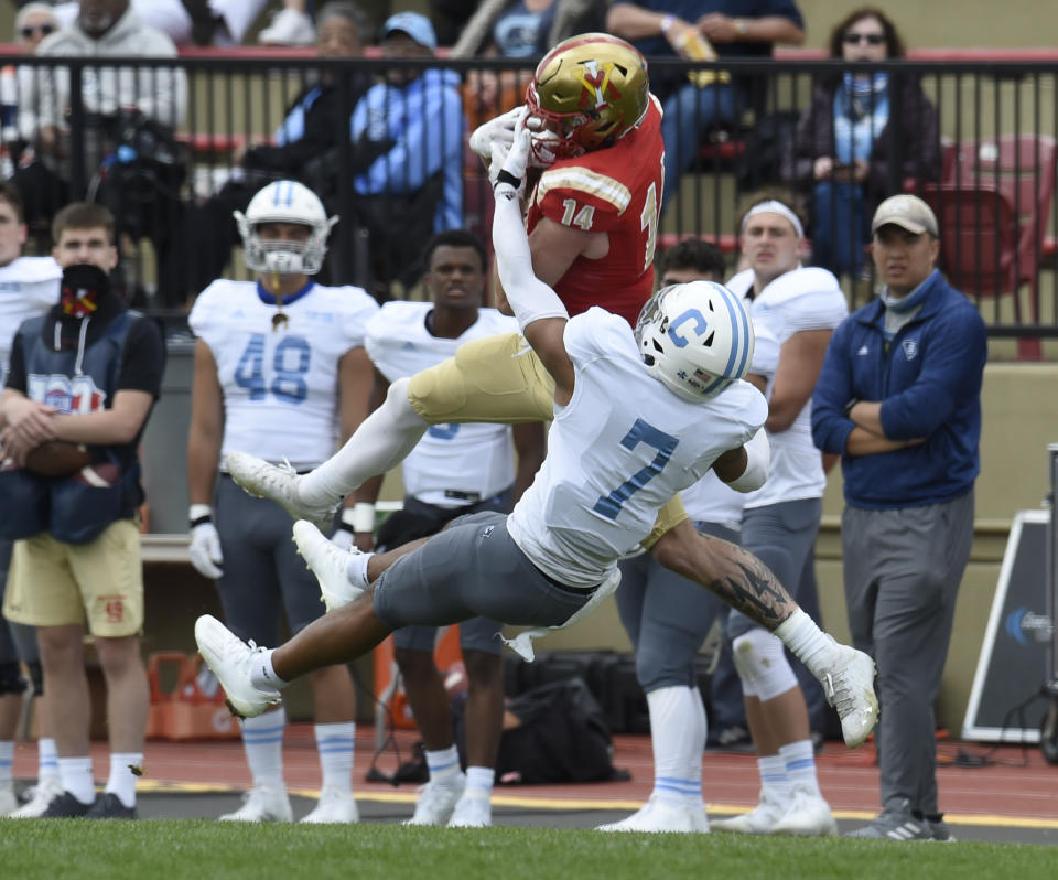 FILE -VMI receiver Jakob Herres pulls down a pass over The Citadel's Destin Mack during an NCAA college football game, Saturday, April 17, 2021 in Lexington, Va. Danny Rocco knows the job he's taken as the football coach at Virginia Military Institute will be harder than any of his three previous head coaching positions. Herres had two Division I offers coming out of high school: VMI and West Point. He picked the Keydets rather than a military commitment. (David Hungate/The Roanoke Times via AP, File)