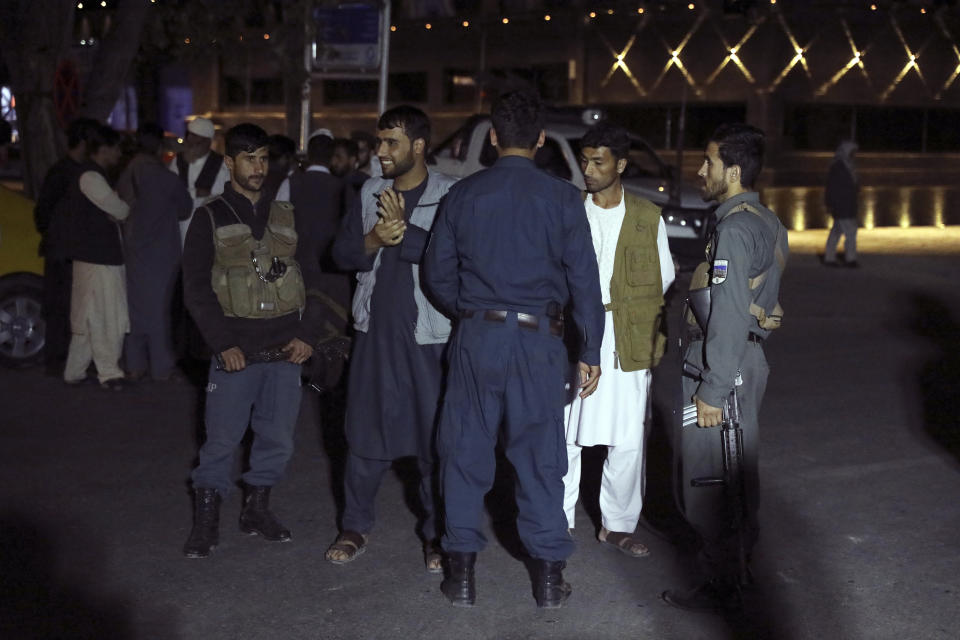 Afghan security police stand guard in front of the hospital in Kabul, Afghanistan, Friday, April 30, 2021. A powerful suicide truck bombing struck a guest house in eastern Afghanistan on Friday, killing at least 14 people and wounding as many as 90, the Interior Ministry said. (AP Photo/Rahmat Gul)