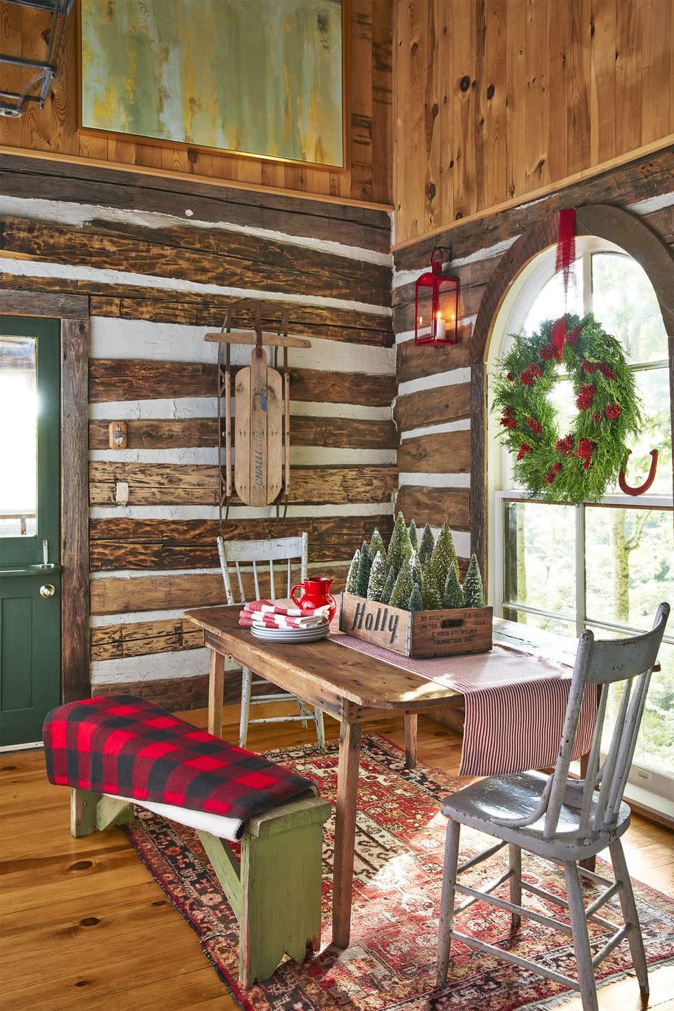 <p>Warm up your home with tons of rustic charm, from buffalo plaid blankets to snow-covered tabletop trees. Round up a dozen or so bottle brush trees in an antique wooden box for an easy centerpiece. </p>