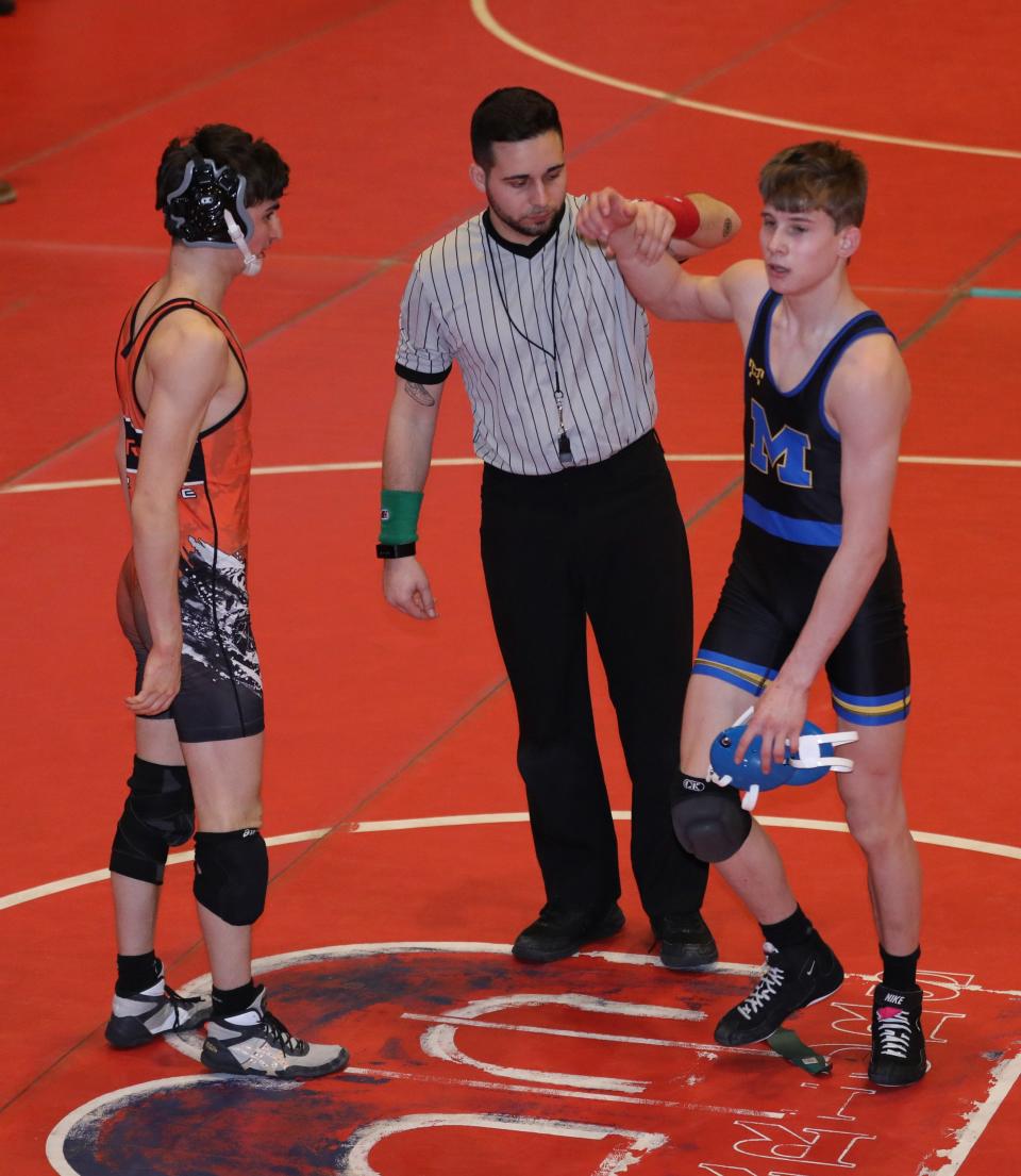 Athletes compete during the first day of the Section One Division I championships at the Westchester County Center in White Plains, Feb. 10, 2024.