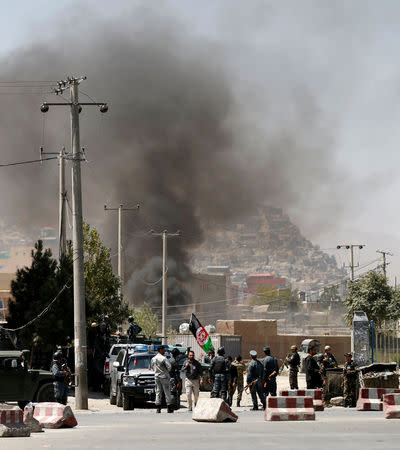 Smoke rises from the site of an attack in Kabul, Afghanistan August 21, 2018. REUTERS/Mohammad Ismail