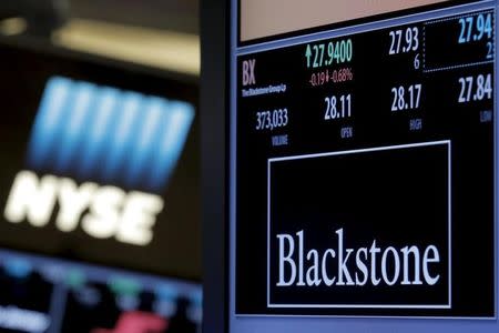 The ticker and trading information for Blackstone Group is displayed at the post where it is traded on the floor of the New York Stock Exchange (NYSE) April 4, 2016. REUTERS/Brendan McDermid