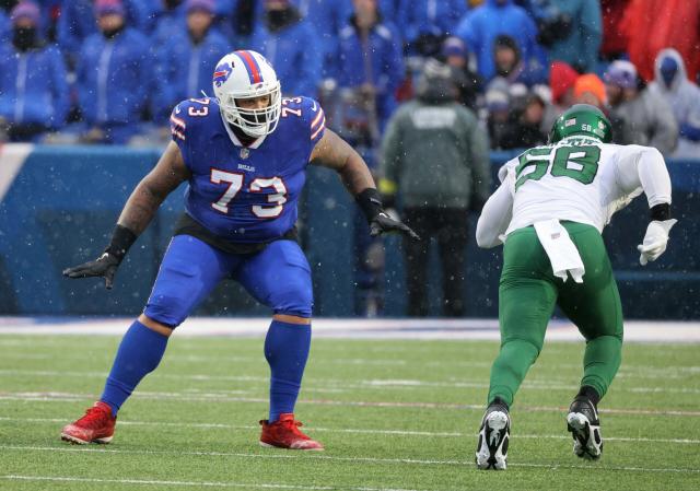 Buffalo Bills tackle Dion Dawkins (73) runs on the field during the second  half of an NFL football game against the New York Jets in Orchard Park,  N.Y., Sunday, Dec. 11, 2022. (