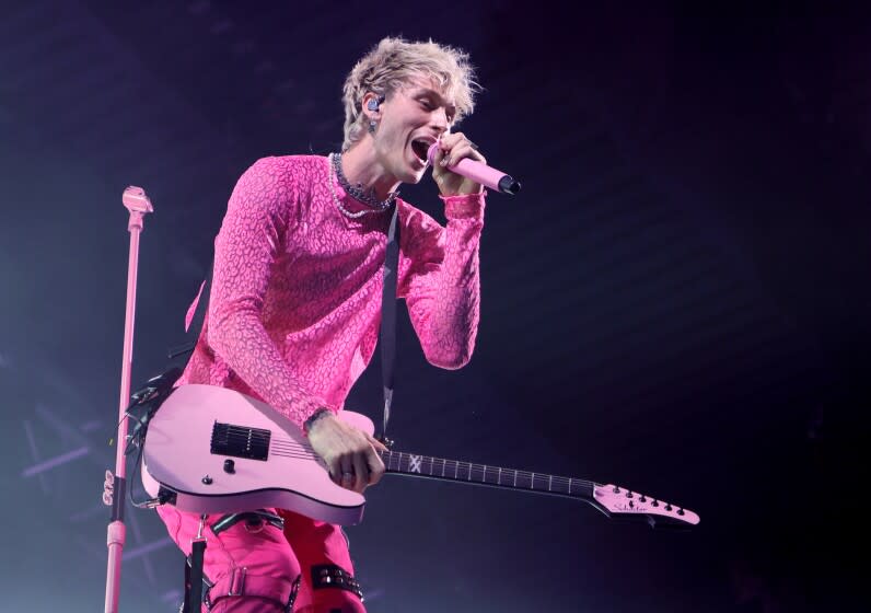 LAS VEGAS, NEVADA - OCTOBER 16: Recording artist Machine Gun Kelly performs during a stop of his Tickets to My Downfall tour at The Theater at Virgin Hotels Las Vegas on October 16, 2021 in Las Vegas, Nevada. (Photo by Ethan Miller/Getty Images)