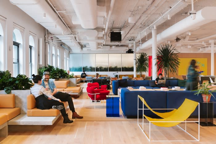 WeWork shared workspace filled with couches and whimsical furniture