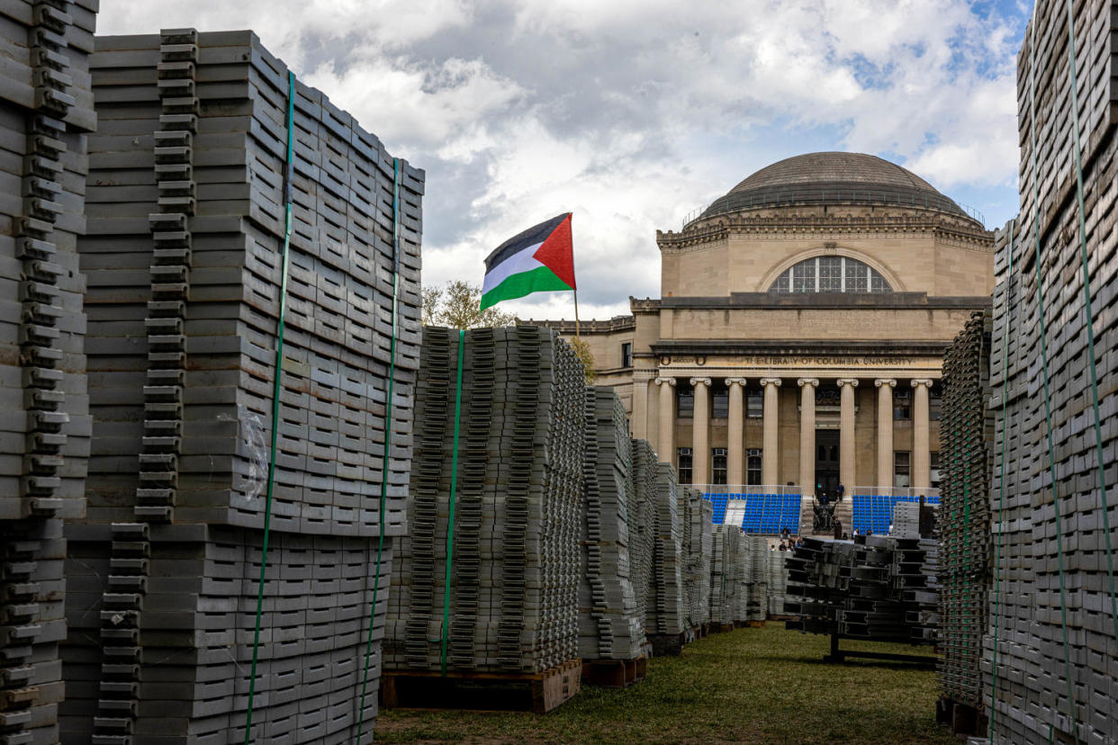 A Palestinian flag flies over supplies set up for Columbia's upcoming commencement ceremony. (Alex Kent / Getty Images file)