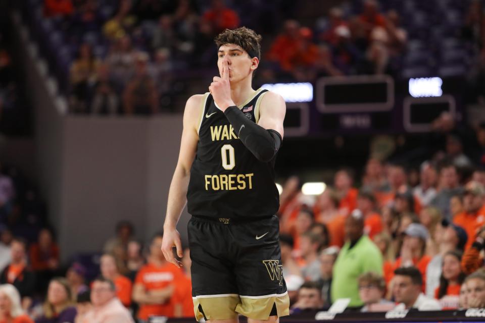 Feb 23, 2022; Clemson, South Carolina, USA; Wake Forest Demon Deacons forward Jake LaRavia (0) reacts after making a three point shot against the Clemson Tigers during the second half at Littlejohn Coliseum.