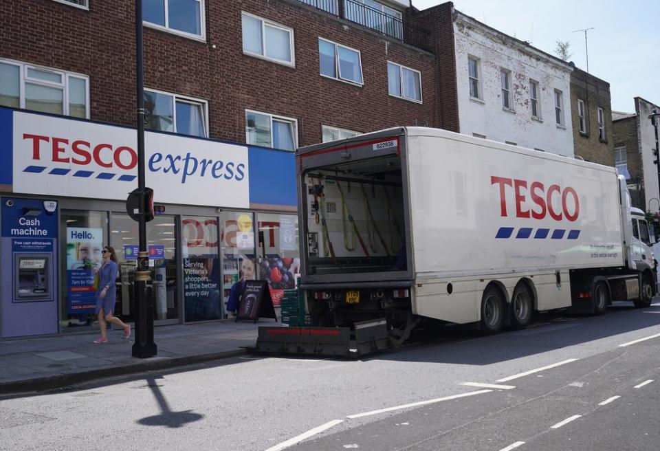 A delivery lorry outside a Tesco Express store in central London (PA Wire)