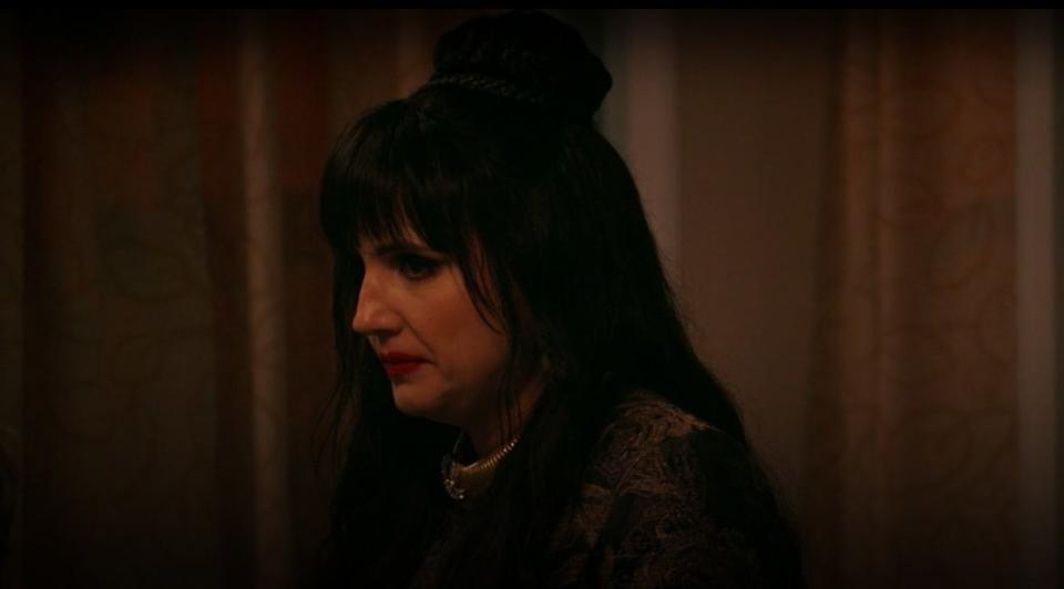 Nadja standing in Sean's house in "What We Do in the Shadows"