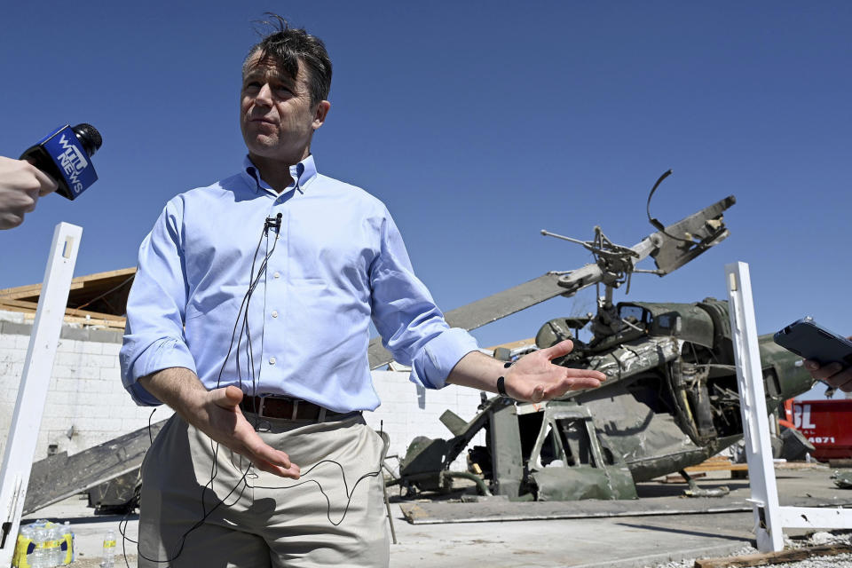 Sen. Todd Young (R-Ind.) talks with the media after touring one of the neighborhoods that was damaged by a recent tornado on Monday, April 3, 2023, in Sullivan, Ind. (Joseph C. Garza/The Tribune-Star via AP)