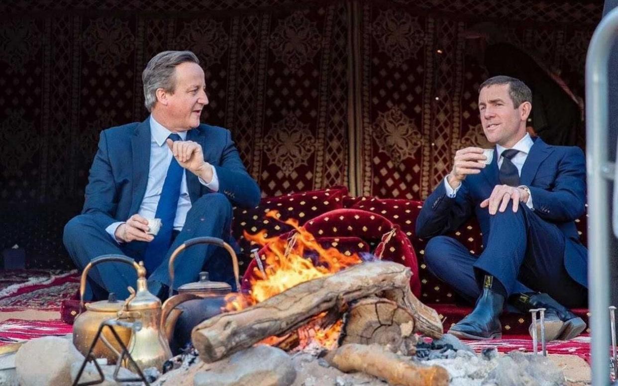 David Cameron and Lex Greensill relax during a trip to Saudi Arabia, on which they met Crown Prince Mohammed bin Salman. Mr Cameron said he raised the issue of human rights, but this picture has led activists to challenge him - WALL STREET JOURNAL