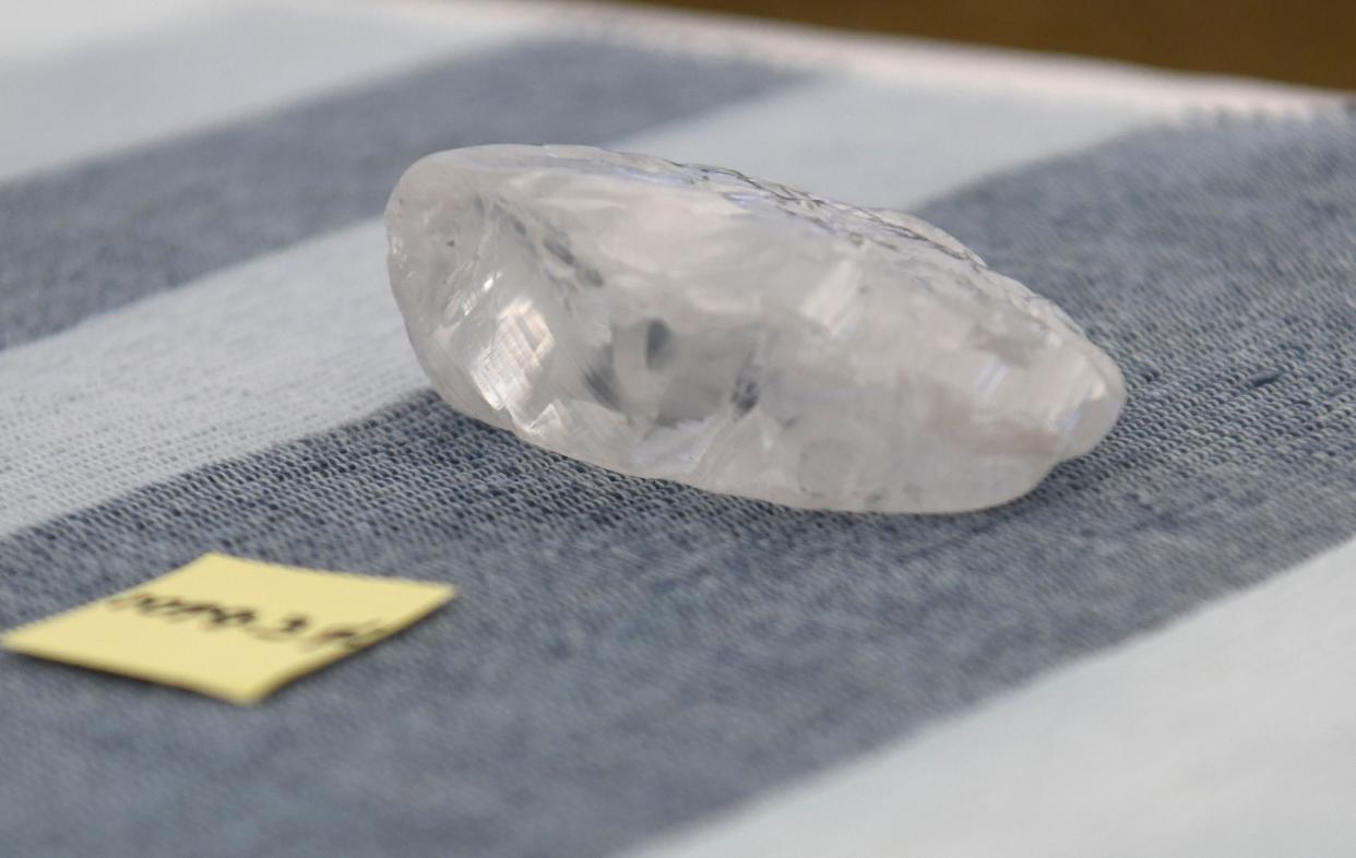 Botswanan diamond firm Debswana said it had unearthed a 1,098-carat stone that it described as the third largest of its kind in the world.