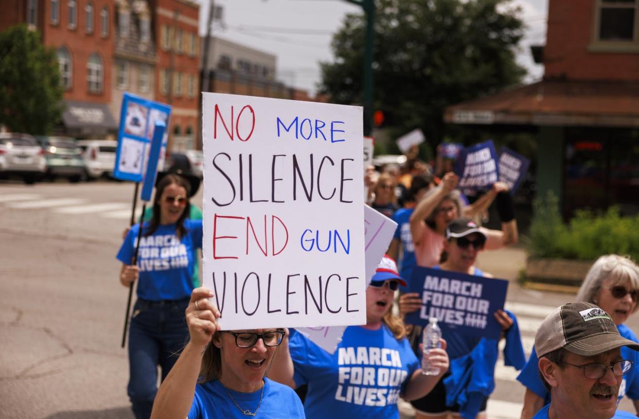 <span class="caption">Preventing people with domestic violence records obtaining guns would be a life-saver.</span> <span class="attribution"><a class="link " href="https://www.gettyimages.com/detail/news-photo/woman-holds-a-placard-that-says-no-more-silence-end-gun-news-photo/1241273019?adppopup=true" rel="nofollow noopener" target="_blank" data-ylk="slk:Jeremy Hogan/SOPA Images/LightRocket via Getty Images;elm:context_link;itc:0;sec:content-canvas">Jeremy Hogan/SOPA Images/LightRocket via Getty Images</a></span>