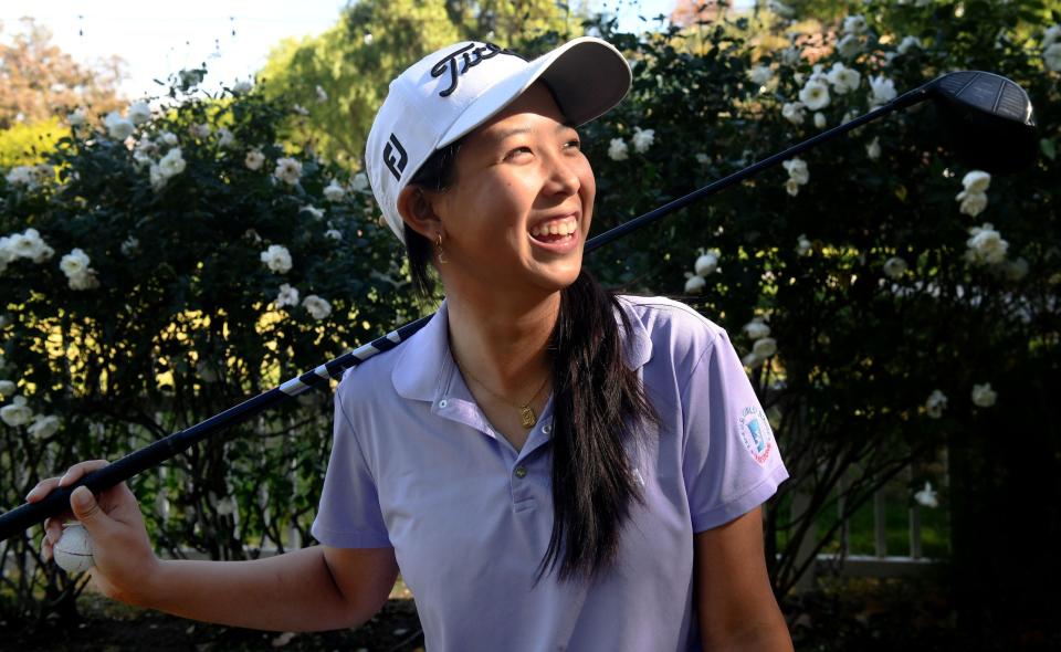 Oak Park's Derica Chiu shows her outgoing personality while practicing at Wood Ranch Golf Club in Simi Valley on Nov. 23. Chiu won the Coastal Canyon League individual title and also led the Eagles to another unbeaten team championship.