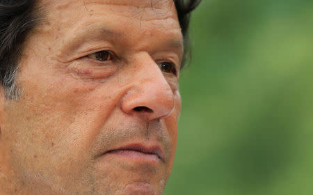 Imran Khan, chairman of the Pakistan Tehreek-e-Insaf (PTI) political party, speaks with a Reuters correspondent during an interview at his home in the hills of Bani Gala on the outskirts of Islamabad, Pakistan July 29, 2017. REUTERS/Caren Firouz