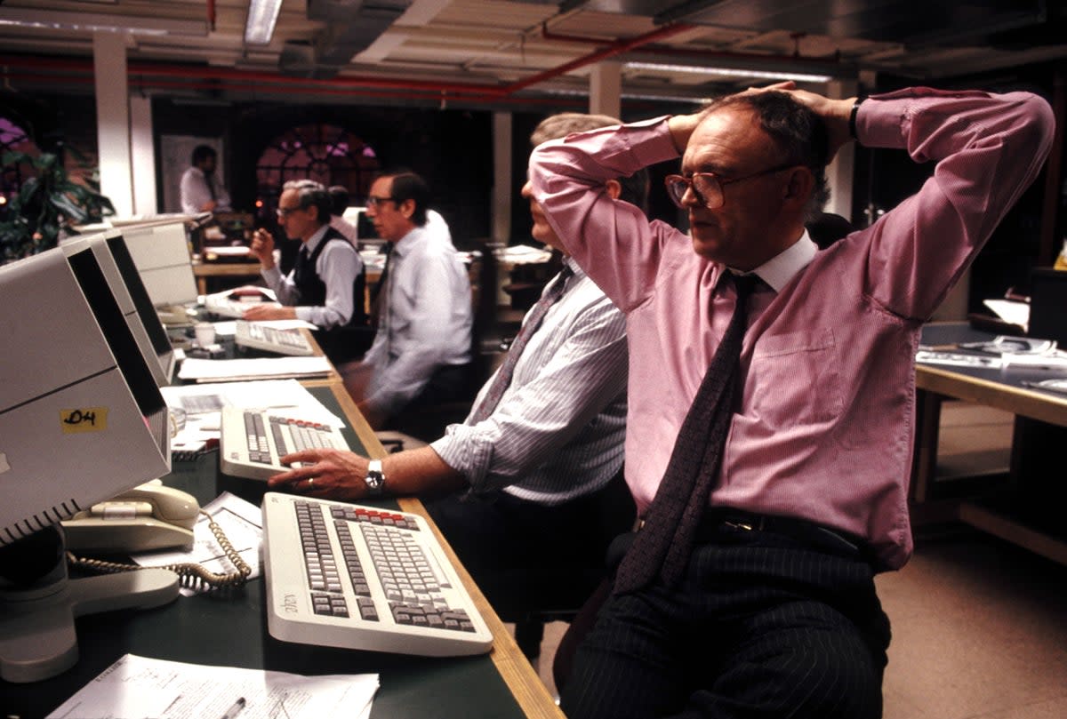 Wilson editing The Times in Wapping, 1987. The Glaswegian had managed to persuade most of his staff to join him there, despite having to run the gauntlet of furious printers  (Alamy)