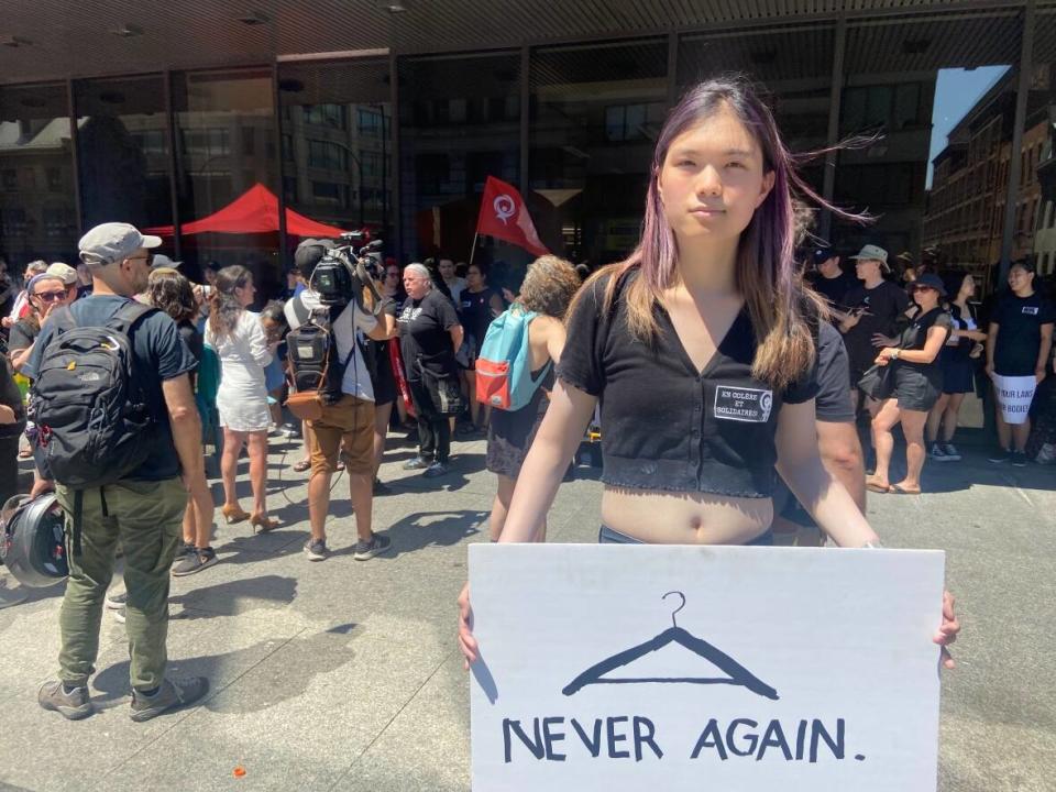 Law student Celeste Trianon spoke to a crowd of hundreds gathered outside the Montreal courthouse Sunday to show their solidarity with Americans, following the reversal of Roe v. Wade. (Rowan Kennedy/CBC - image credit)