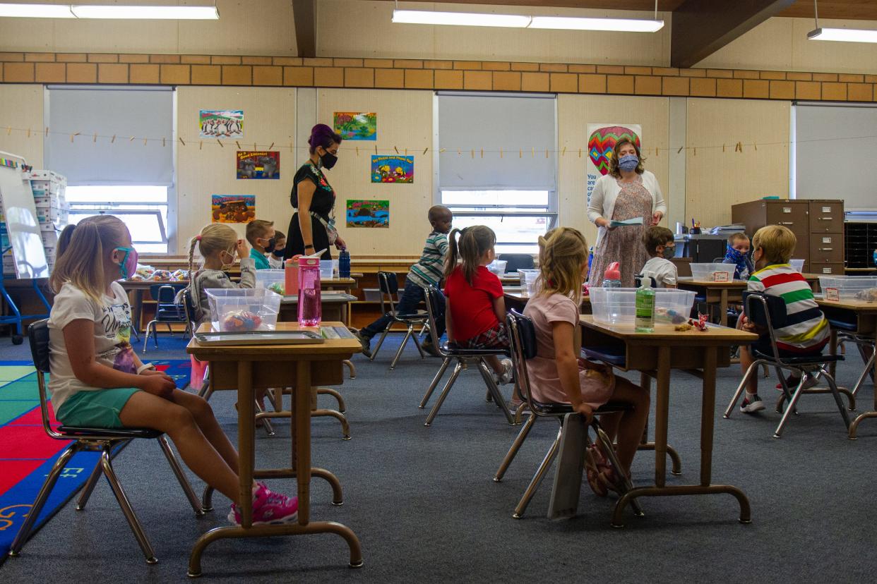 Students watch as kindergarten teacher Mrs. Londa Hart delivers instructions on the first day of school at Chief Joseph Elementary School in 2020