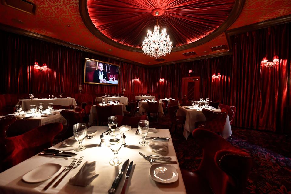 The new Ruby Room at Jeff Ruby's Steakhouse, is a private dining area with seating for 40, features a swagged ceiling, plush velvet booths and an oversized chandelier Friday, Aug. 25, 2023 in Louisville Ky.