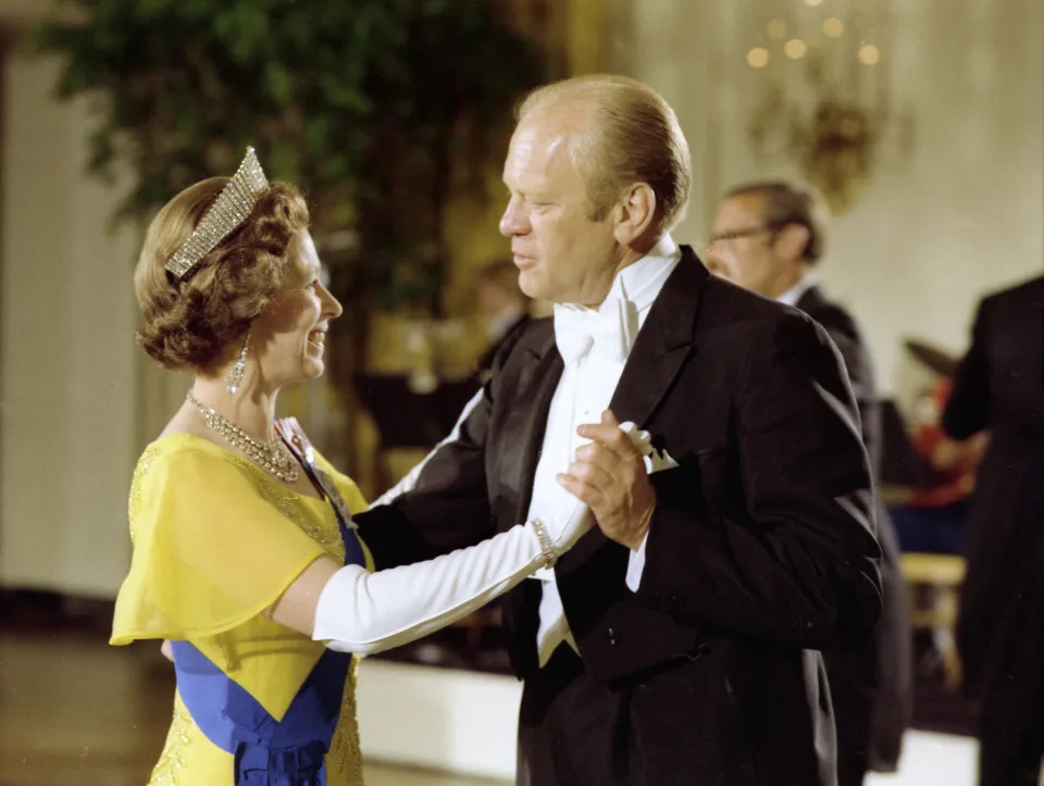 <p>The Queen dancing with US president Gerald Ford during a state dinner at the White House in Washington DC on 7 July 1976. (Reuters)</p> 