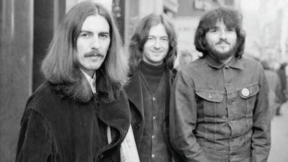 Harrison with Eric Clapton and Delaney Bramlett  while on tour with Delaney & Bonnie, Birmingham,  England, December 3, 1969