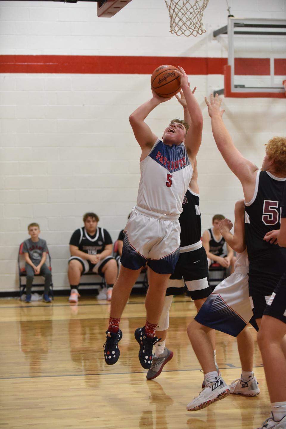 Britton Deerfield's Logan Shiels goes up for a shot during a game last season.