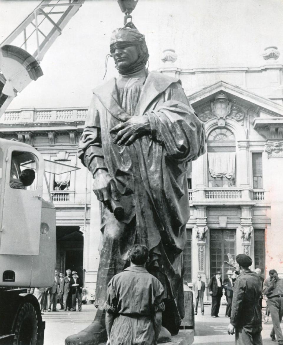 The Christopher Columbus statue is shown in Italy being readied for a trip aboard the Italian liner Cristoforo Colombo for shipment to the United States in 1955.