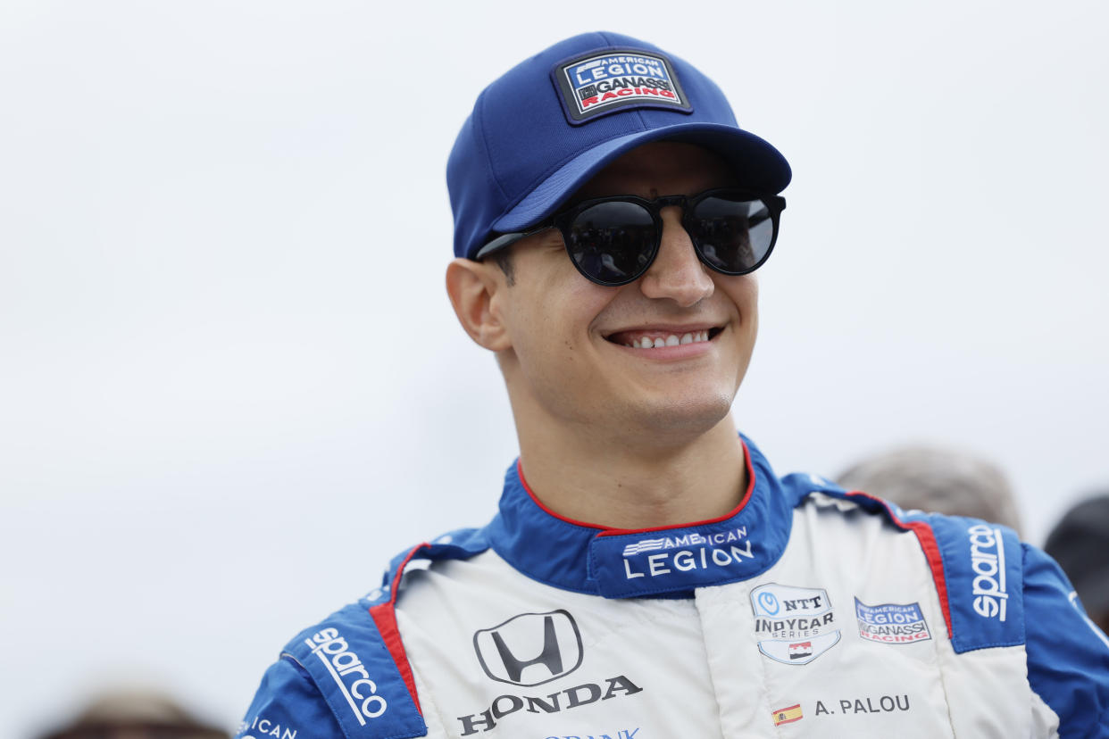 Sep 3, 2023; Portland, Oregon, USA; NTT Indy Car driver Alex Palou (10) smiles before the NTT INDYCAR Series at Portland International Raceway. Mandatory Credit: Soobum Im-USA TODAY Sports