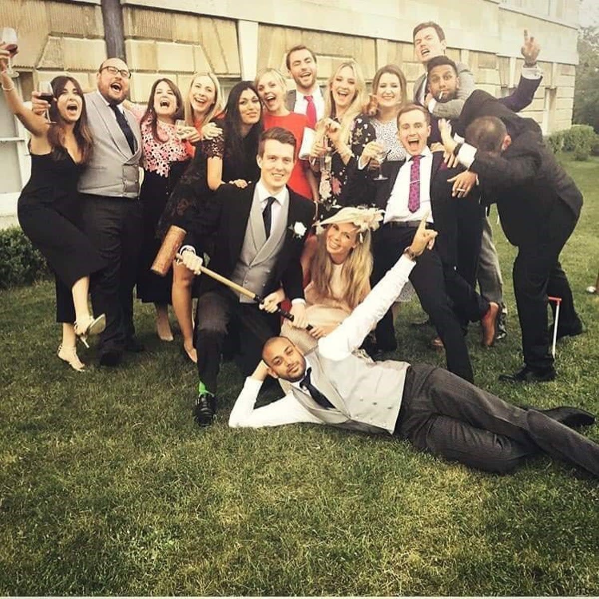 Carrie Johnson (bottom centre) pictured with Ben Mallet (bottom left) and other friends at a wedding in 2016 (Carrie Johnson/Instagram)