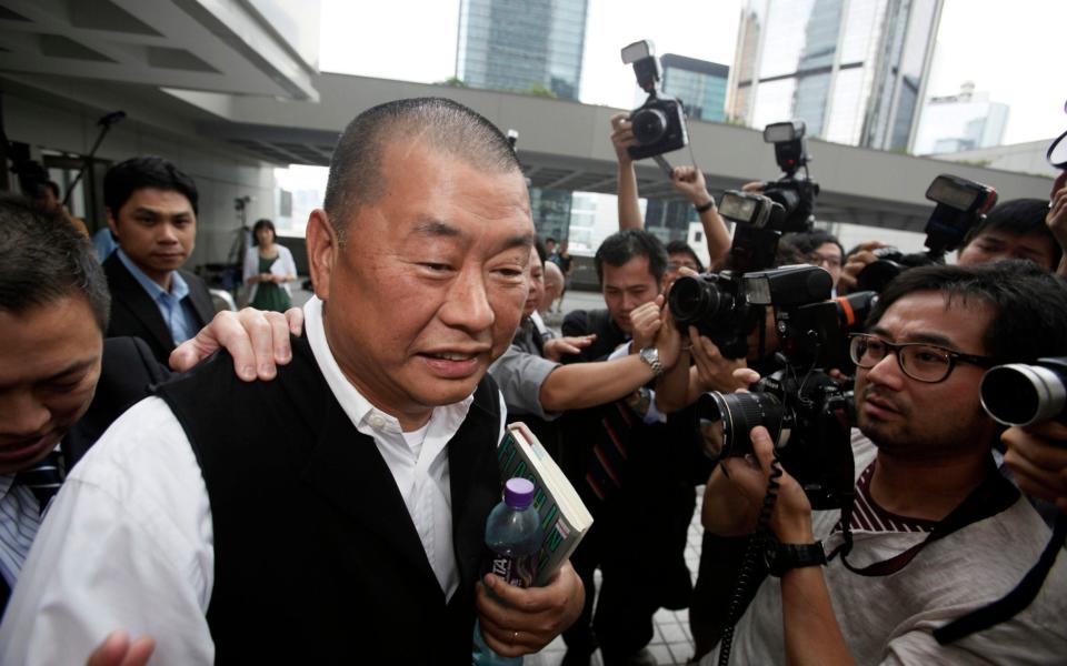 Jimmy Lai appears in a court in Hong Kong after a Chinese man was convicted in Hong Kong for allegedly planning to shoot two prominent pro-democracy figures - AP