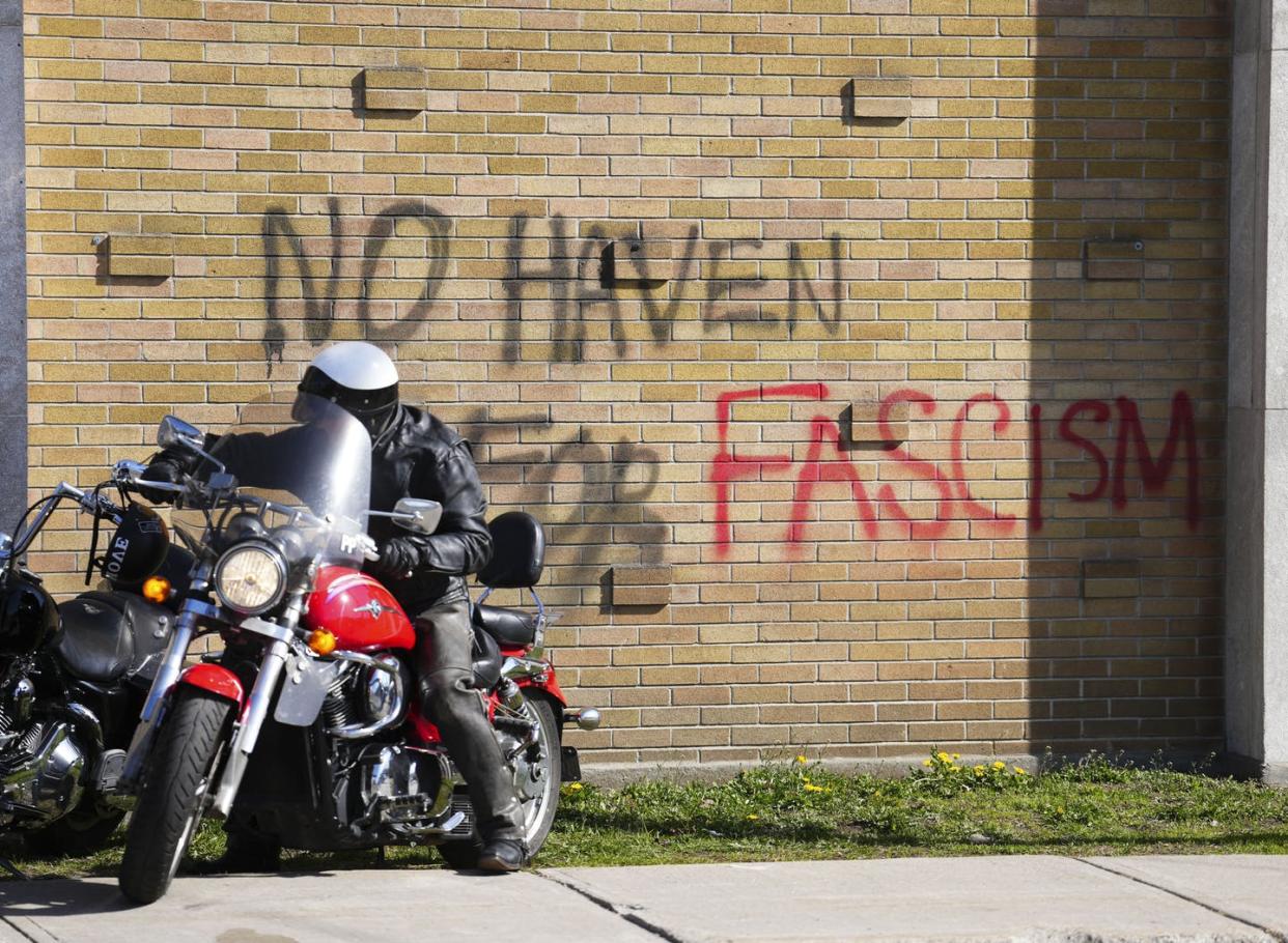 <span class="caption">Graffiti is seen on the outside of the Capital City Bikers' Church in Ottawa in May 2022.</span> <span class="attribution"><span class="source">THE CANADIAN PRESS/Sean Kilpatrick</span></span>