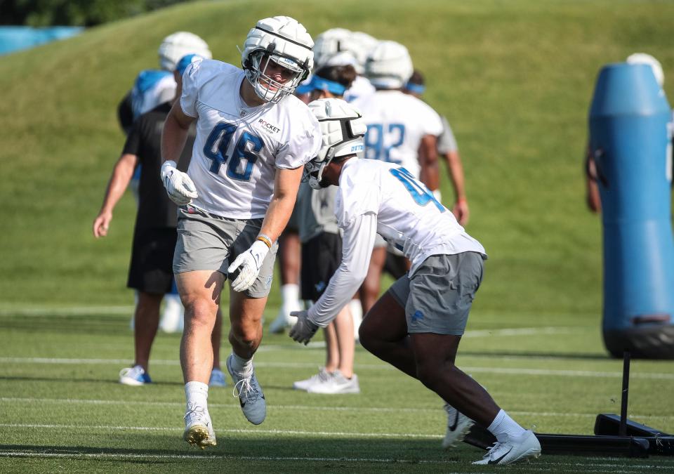 Detroit Lions linebacker Jack Campbell practices with linebacker Jalen Reeves-Maybin during training camp at Detroit Lions Headquarters and Training Facility in Allen Park on Monday, July 24, 2023.