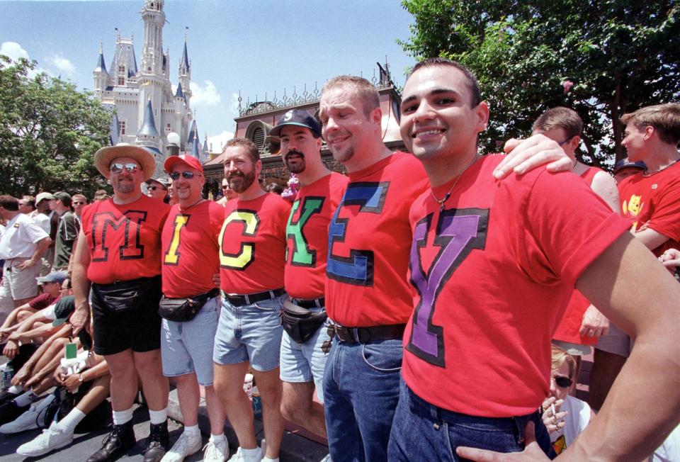 Gay Days participants show their love for Mickey Mouse at Walt Disney World in 1999.