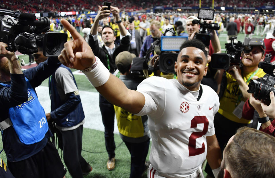 FILE - In this Saturday, Dec. 1, 2018 file photo, Alabama quarterback Jalen Hurts (2) speaks to fans after the Southeastern Conference championship NCAA college football game between Georgia and Alabama, in Atlanta. Alabama won 35-28. Even before Hurts came off the bench to lead Alabama's comeback win over Georgia in the Southeastern Conference championship game, his popularity has only seemed to grow since his role shrank. (AP Photo/John Amis, File)