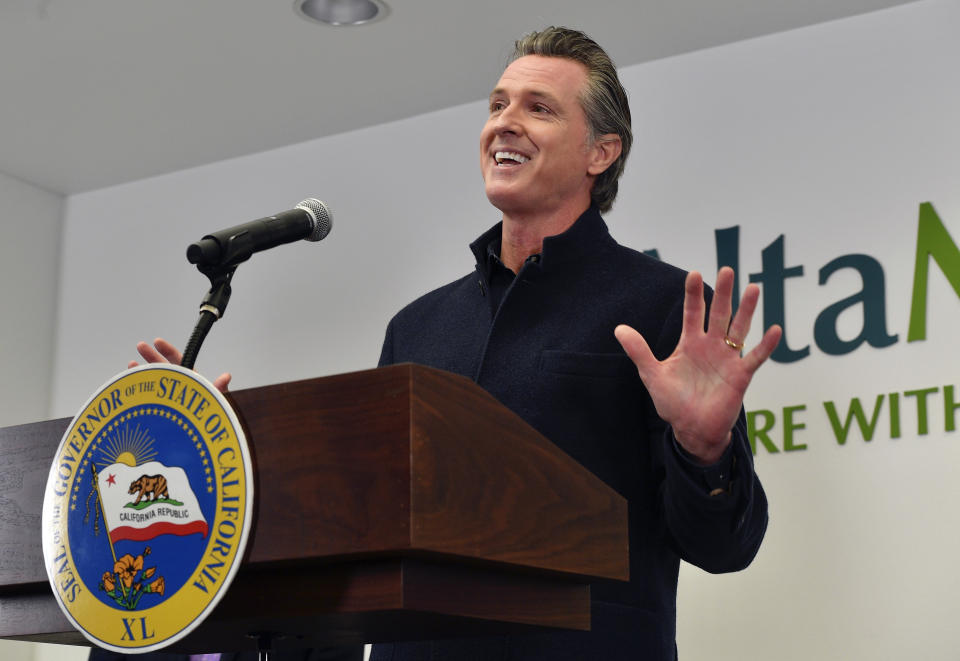 California Gov. Gavin Newsom speaks during a press conference at a COVID-19 vaccination site at AltaMed in Santa Ana, Calif., on Thursday, March 25, 2020. California is expanding its vaccine eligibility to anyone 50 and over starting in April and anyone 16 and over on April 15, Gov. Newsom said Thursday. (Jeff Gritchen/The Orange County Register via AP)