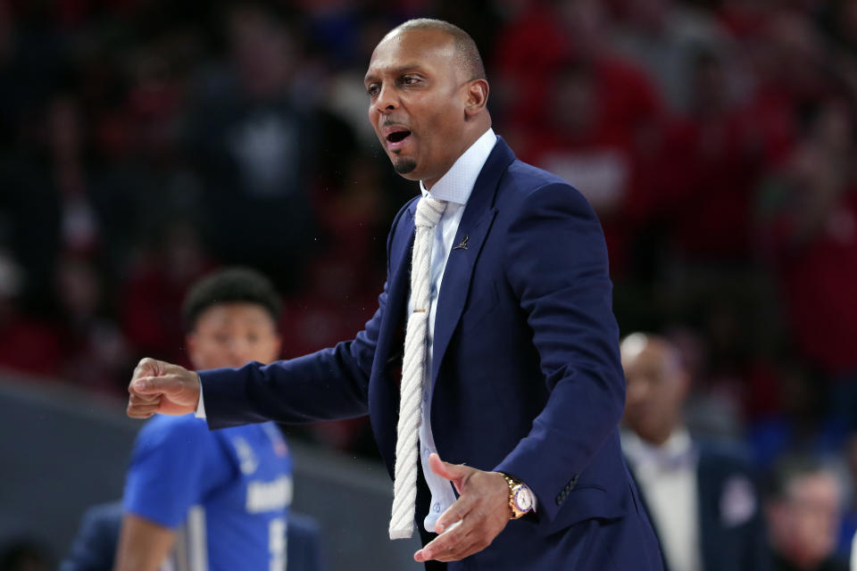 FILE - Memphis head coach Penny Hardaway questions a foul call during the second half of an NCAA college basketball game against Houston, Sunday, March 8, 2020, in Houston. As the NCAA gets set announce its plans for the 2020-21 college basketball season, there are clear precedents and blueprints in place should it decide to go the bubble route. “Maybe do it for maybe a week or two at a time, playing a certain amount of games and getting retested after you come back or something like that,” Memphis coach Penny Hardaway said. "It’s possible, it’s not going to be easy.”(AP Photo/Michael Wyke, File)