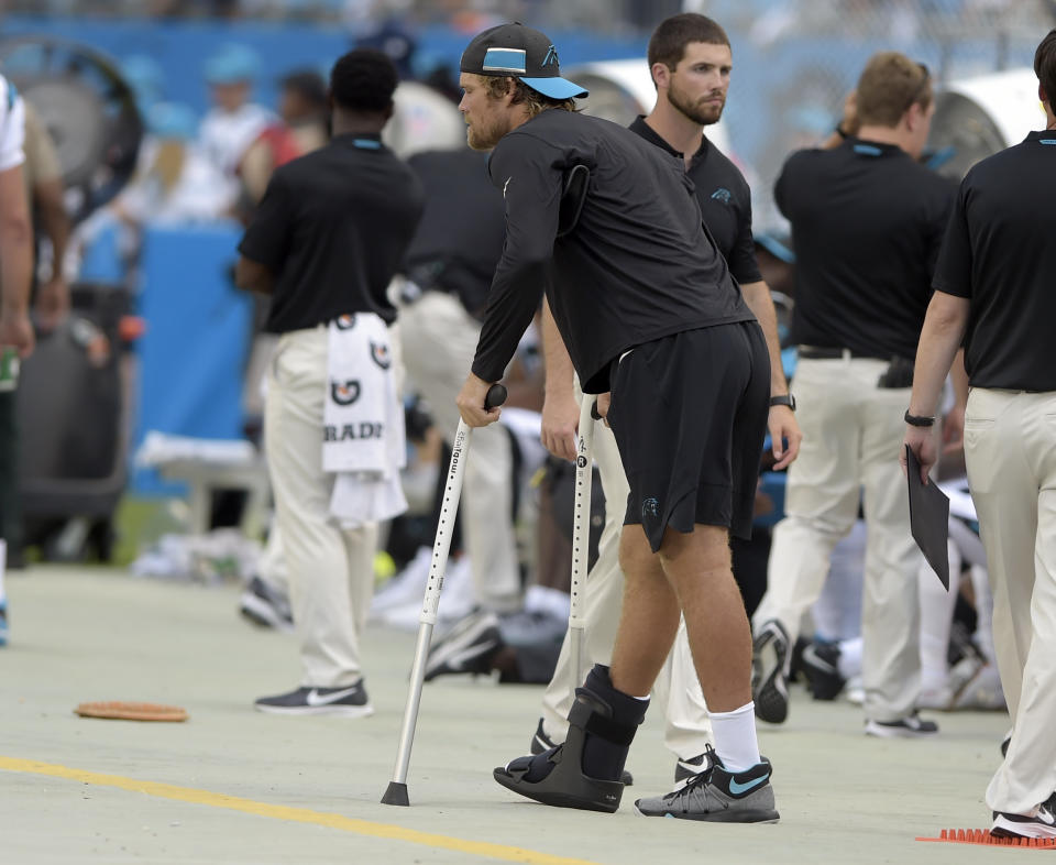 Greg Olsen will miss time after re-fracturing his foot. (AP Photo)