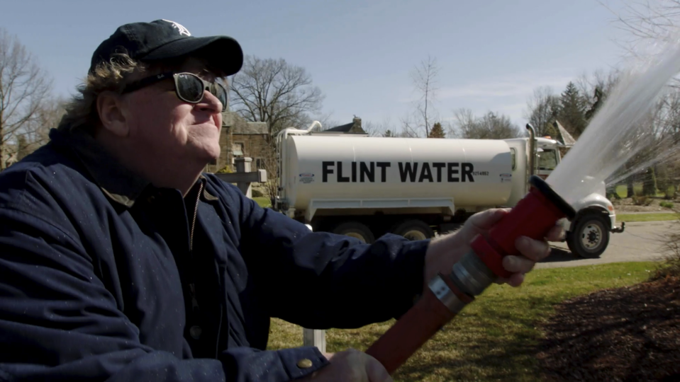 This image released by State Run Films/Briarcliff Entertainment shows filmmaker Michael Moore in a scene from the documentary "Fahrenheit 11/9." (State Run Films/Briarcliff Entertainment via AP)