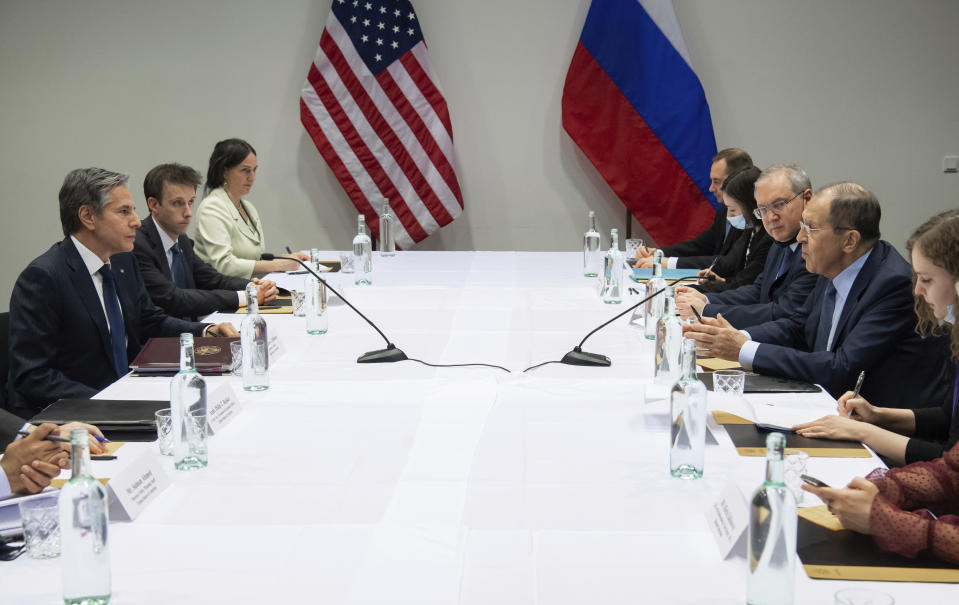 U.S. Secretary of State Antony Blinken, left, meets with Russian Foreign Minister Sergey Lavrov, right, at the Harpa Concert Hall in Reykjavik, Iceland, Wednesday, May 19, 2021, on the sidelines of the Arctic Council Ministerial summit. (Saul Loeb/Pool Photo via AP)