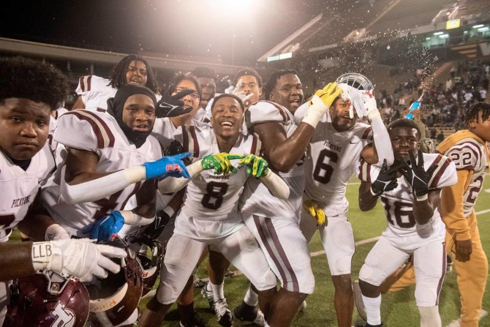 Picayune players celebrate after winning the 5A State Championship at M.M. Roberts Stadium in Hattiesburg on Friday, Dec. 2, 2022.