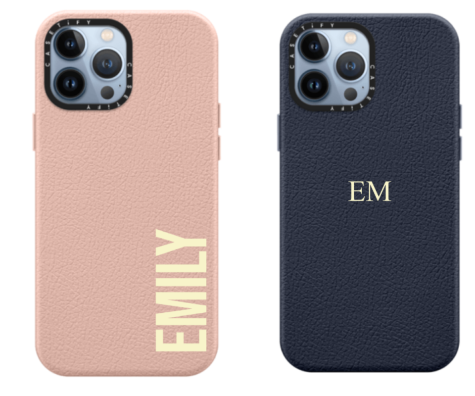 A pale pink phone case on left and a navy customised phone case on the right infront of a white background.