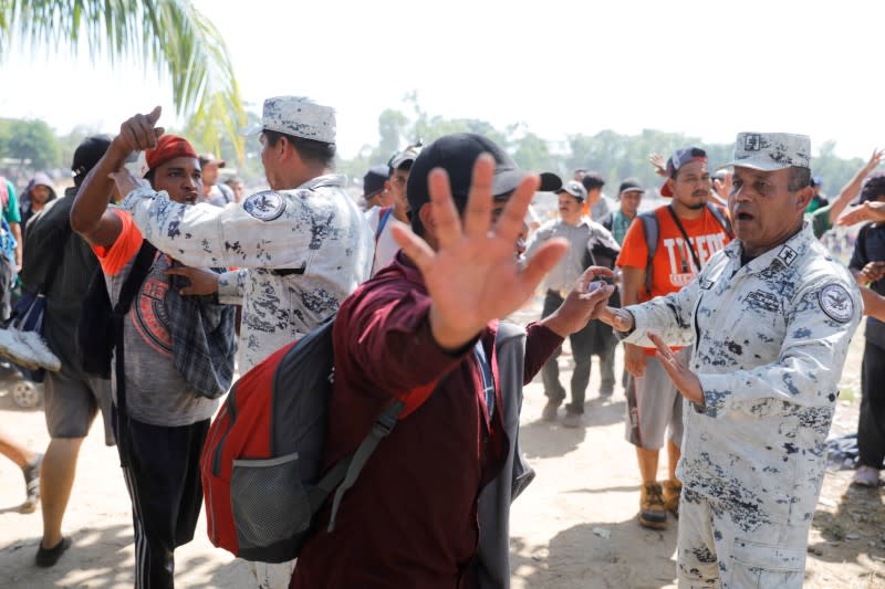 Large migrant caravan prepares to enter Mexico from Guatemala