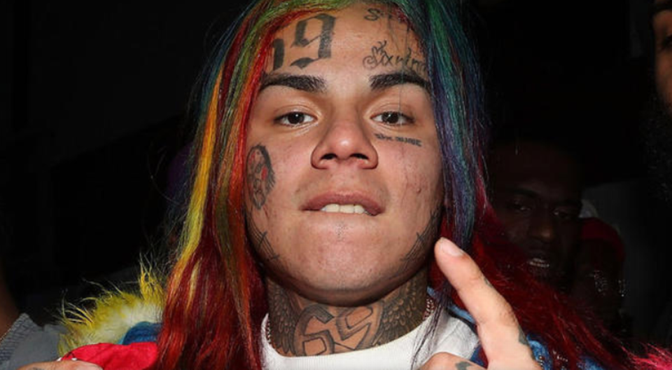 The rapper known as 6ix9ine was punched by his girlfriend in Miami, according to police.