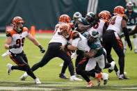 Cincinnati Bengals' Joe Burrow (9) is tackled by Philadelphia Eagles' Derek Barnett (96) during the first half of an NFL football game, Sunday, Sept. 27, 2020, in Philadelphia. (AP Photo/Chris Szagola)