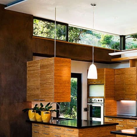 Bamboo cabinets blend in with the eucalyptus