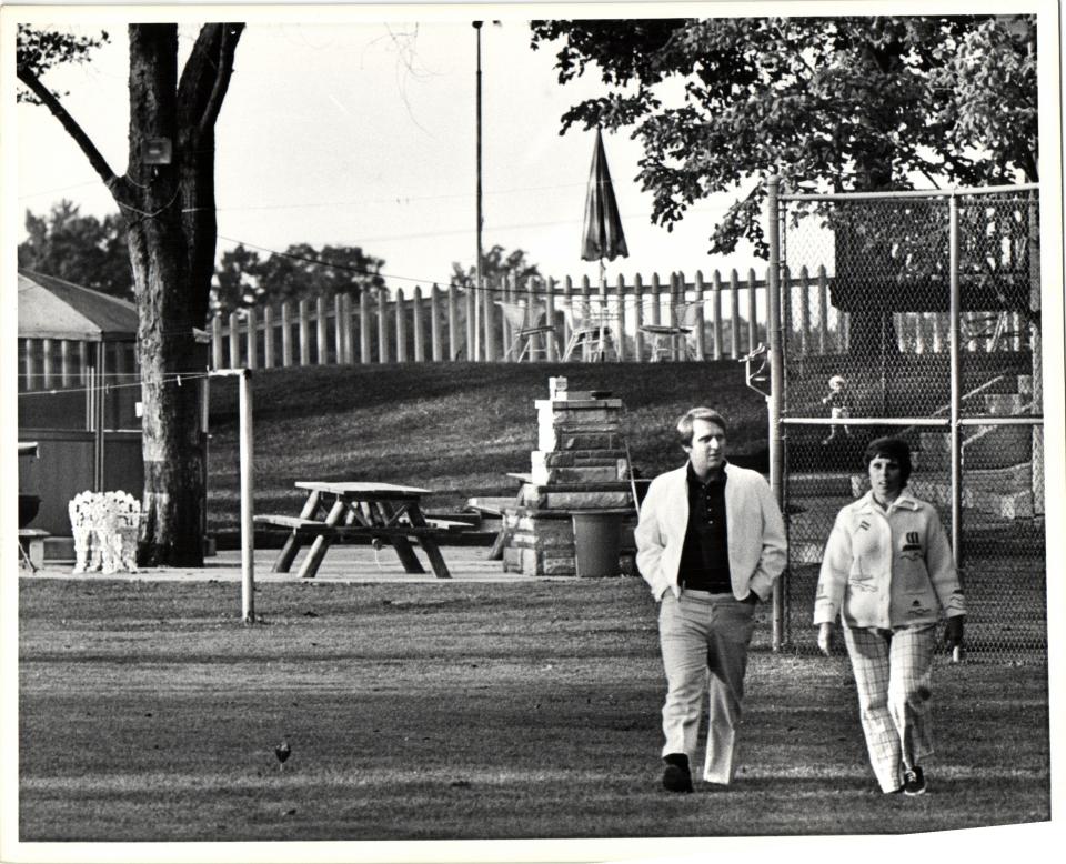 James P. Hoffa and his sister Barbara Crancer walk the grounds of Jimmy Hoffa's home shortly after his disappearance in 1975.