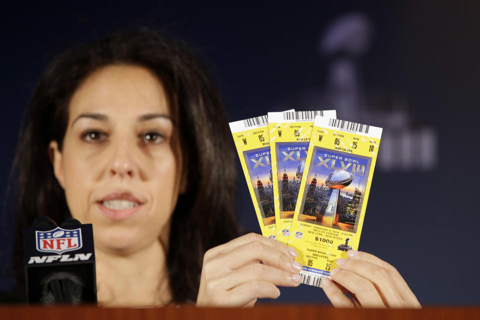 Anastasia Danias, with the NFL, speaks about the security features of Super Bowl XLVIII tickets during a news conference on counterfeit merchandise at the NFL Super Bowl XLVIII media center, Thursday, Jan. 30, 2014, in New York. (AP Photo)